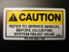 Caution Adjusting System Relief Valve